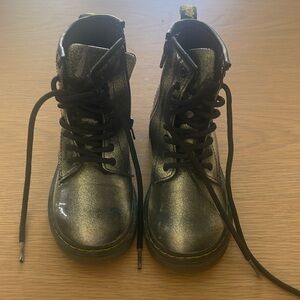 Dr. Martens gold and black boots. Rubber sole. Never worn.